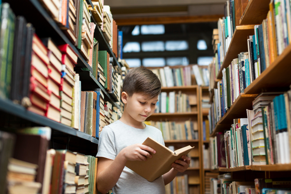 low-angle-boy-library-reading